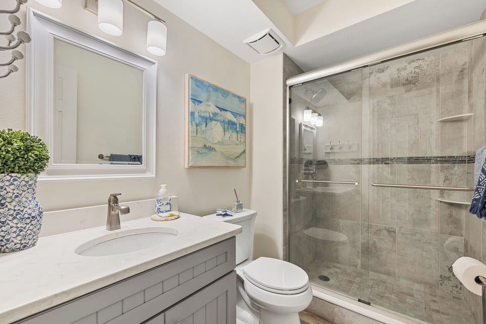 Updated and modern primary bathroom.