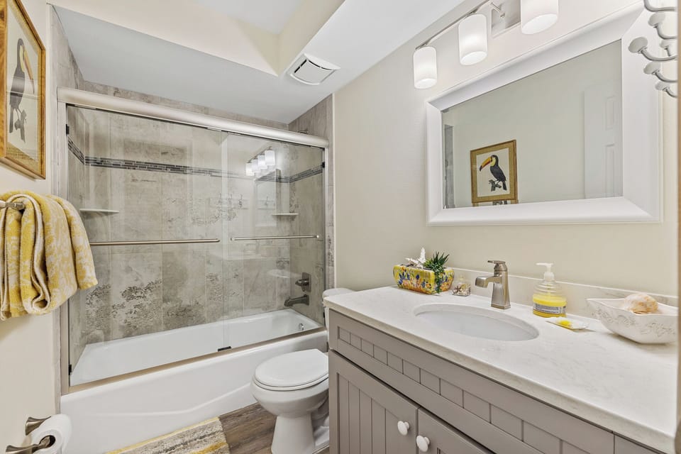 Updated and spacious guest bathroom.