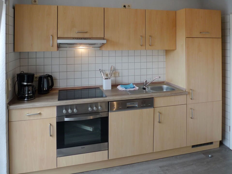 Cabinetry, Countertop, Kitchen, Room, Furniture, Property, Cupboard, Major Appliance, Kitchen Stove, Tile