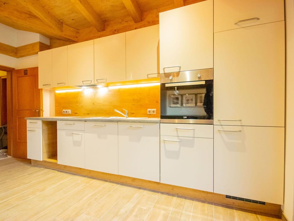 Countertop, Cabinetry, Building, Kitchen Appliance, Kitchen, Kitchen Stove, Wood, Home Appliance, House, Wood Stain