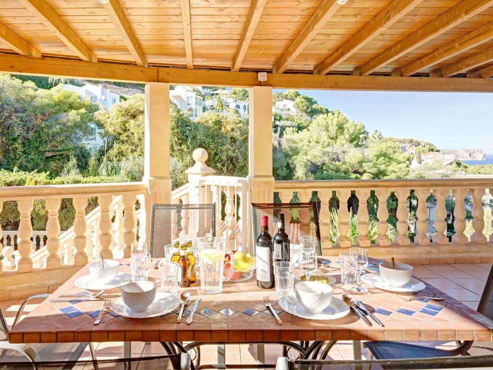 Table, Furniture, Tableware, Property, Plant, Wood, Interior Design, Chair, Porch, Sky
