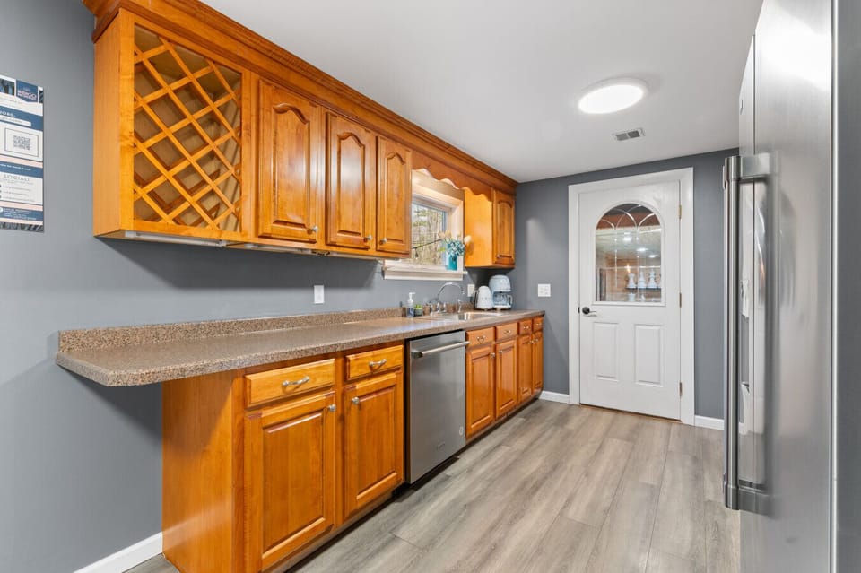 Neat kitchen cabinets offering plenty of storage space.