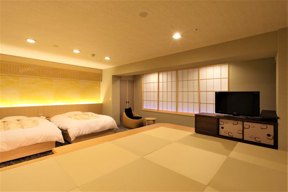 Twin Room with Tatami Area, New Building - Korin, Non Smoking | Down comforters, in-room safe, individually decorated