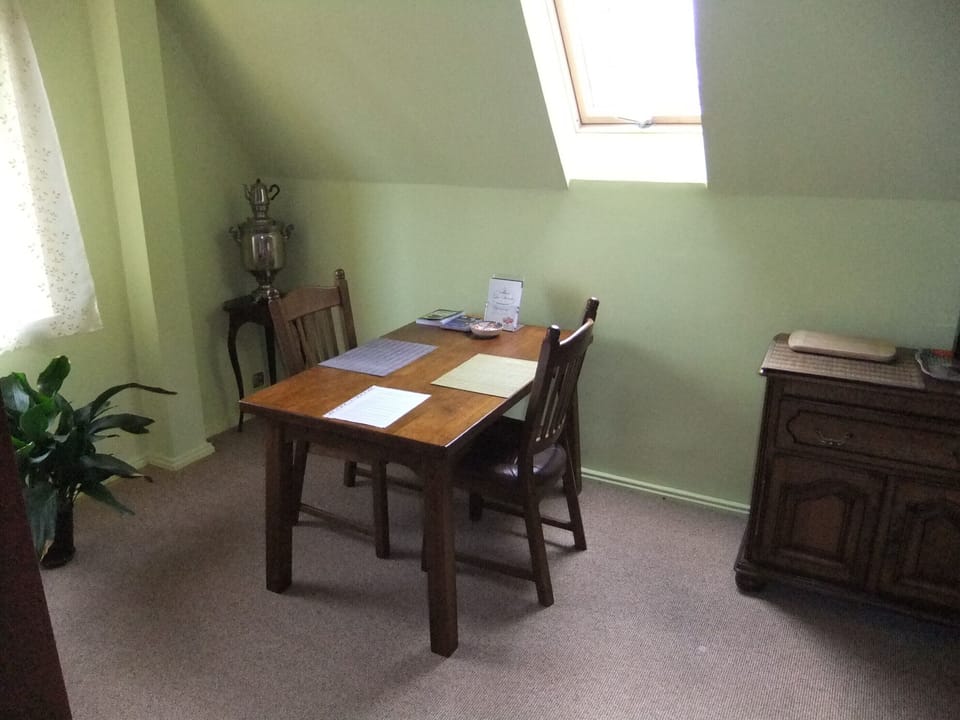 Apartment, 1 Bedroom, Garden View | Living area | Books