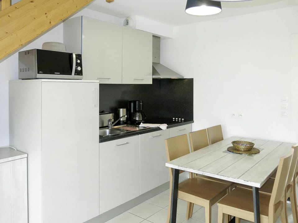 Property, Room, Furniture, Kitchen, House, Building, Interior Design, Kitchen Stove, Countertop, Cabinetry
