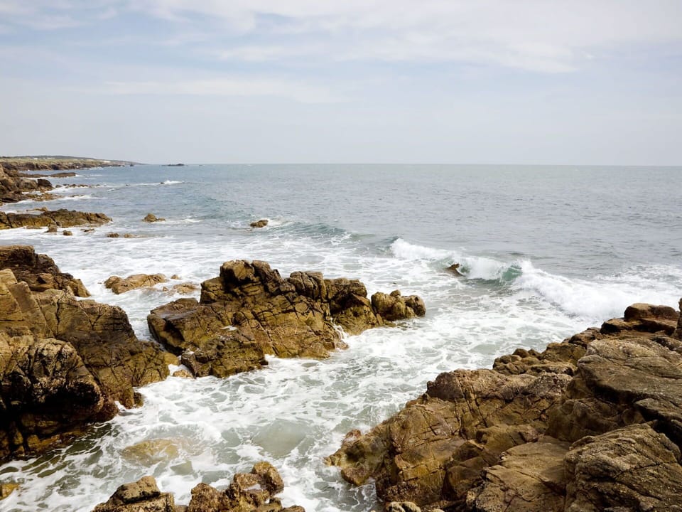 Water, Sky, Natural Environment, Beach, Building, Body Of Water, Coastal And Oceanic Landforms, Tower