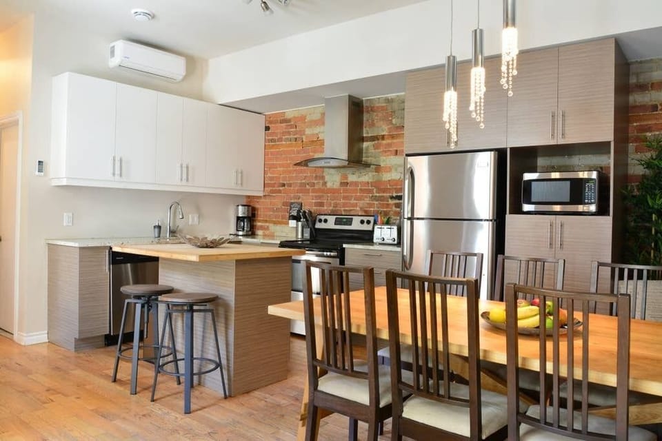 The kitchen has all appliances, including a dishwasher.