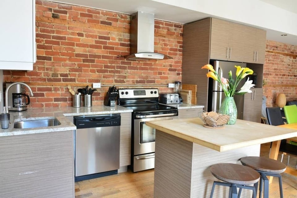 The kitchen has all appliances including a dishwasher.