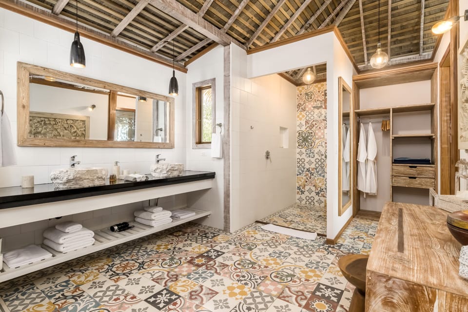 Shower, rainfall showerhead, designer toiletries, hair dryer