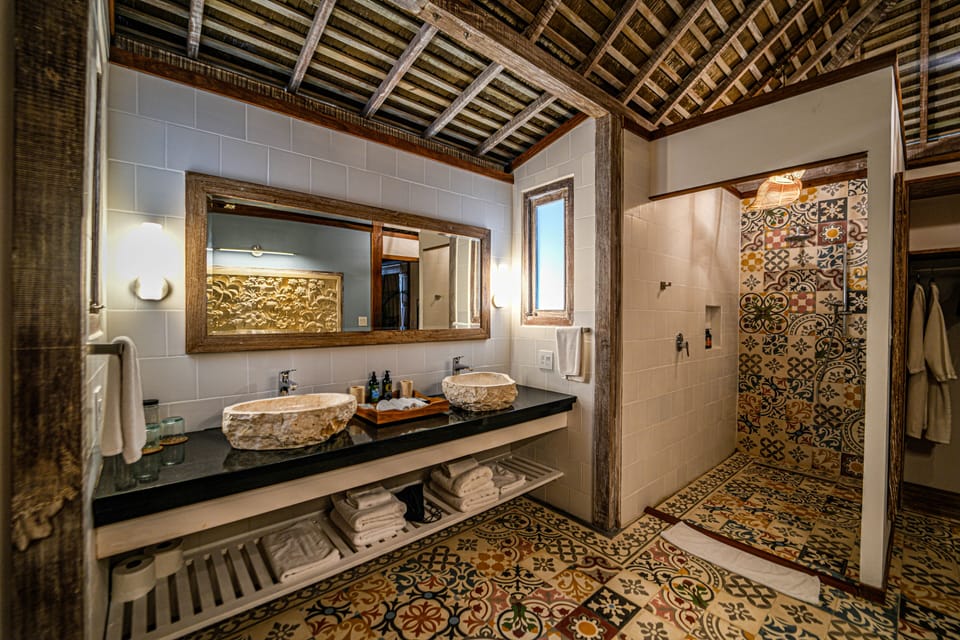 Overwater Pool Villa | Bathroom | Shower, rainfall showerhead, designer toiletries, hair dryer