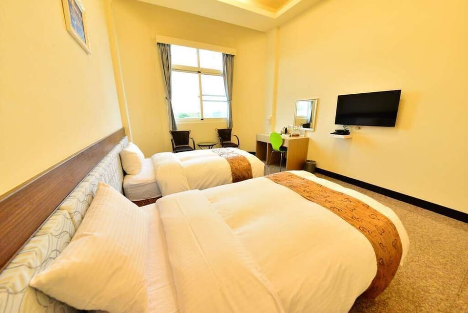Double or Twin Room | Down comforters, desk, blackout drapes, free WiFi