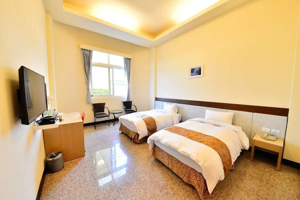 Double or Twin Room | Down comforters, desk, blackout drapes, free WiFi