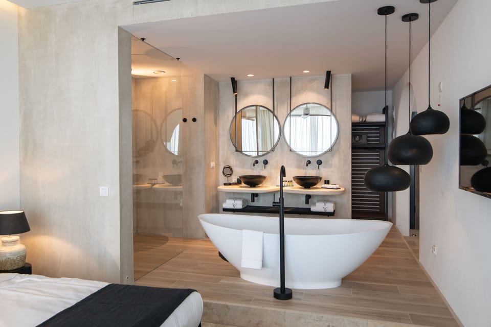Separate tub and shower, slippers, towels