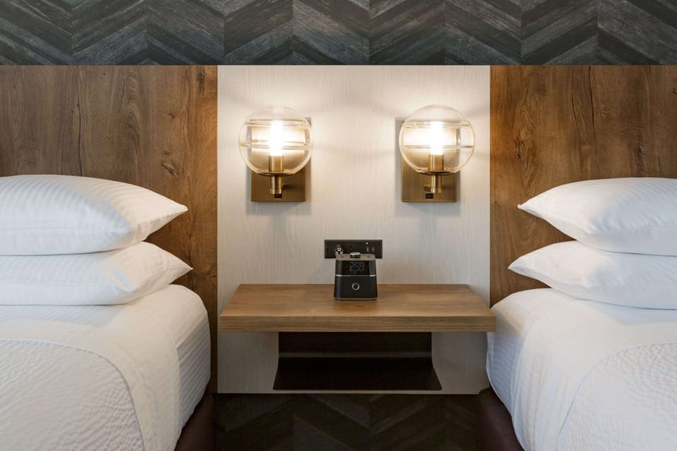 Hypo-allergenic bedding, pillowtop beds, desk, laptop workspace
