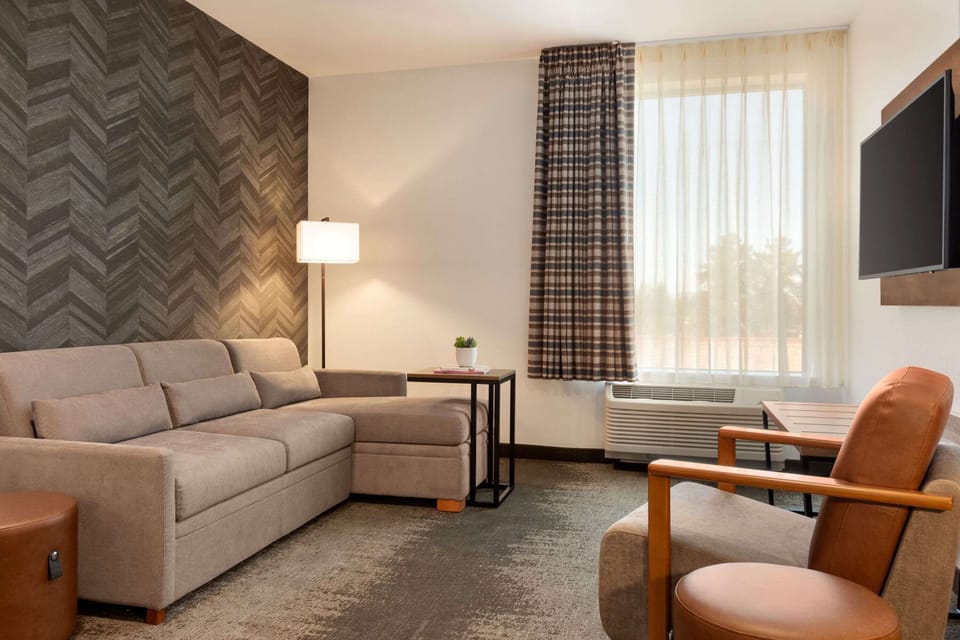 Hypo-allergenic bedding, pillowtop beds, desk, laptop workspace