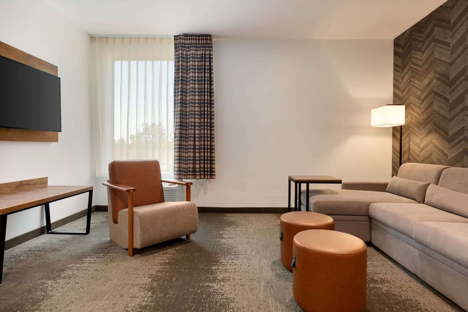 Hypo-allergenic bedding, pillowtop beds, desk, laptop workspace
