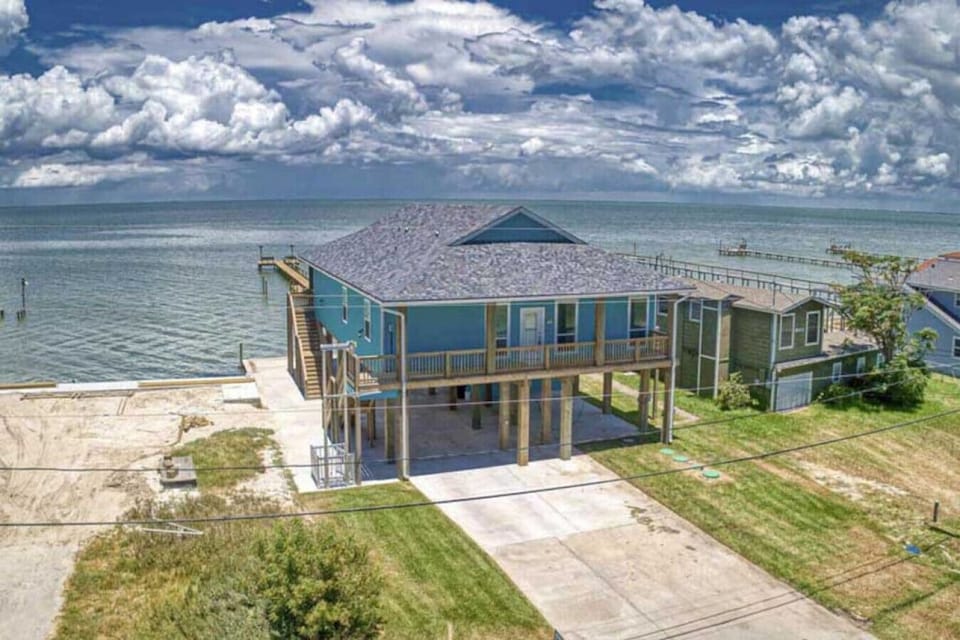 Front of home with bay view