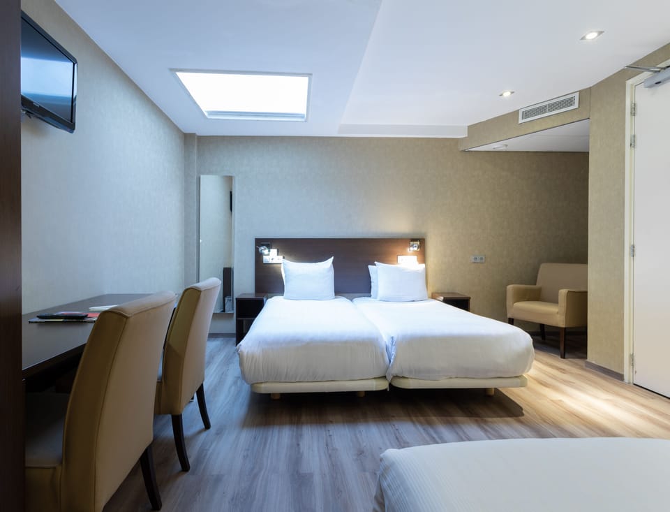 Standard Quadruple Room | In-room safe, desk, iron/ironing board, free WiFi
