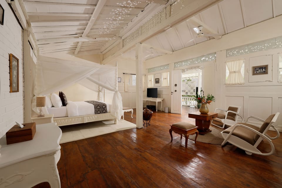 One-Bedroom Cottage Suite Pool View | Premium bedding, minibar, in-room safe, individually decorated