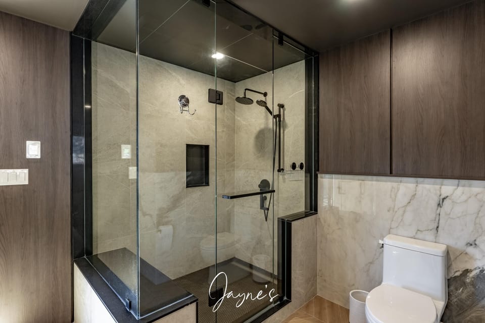 Modern bathroom with sleek glass shower and elegant finishes