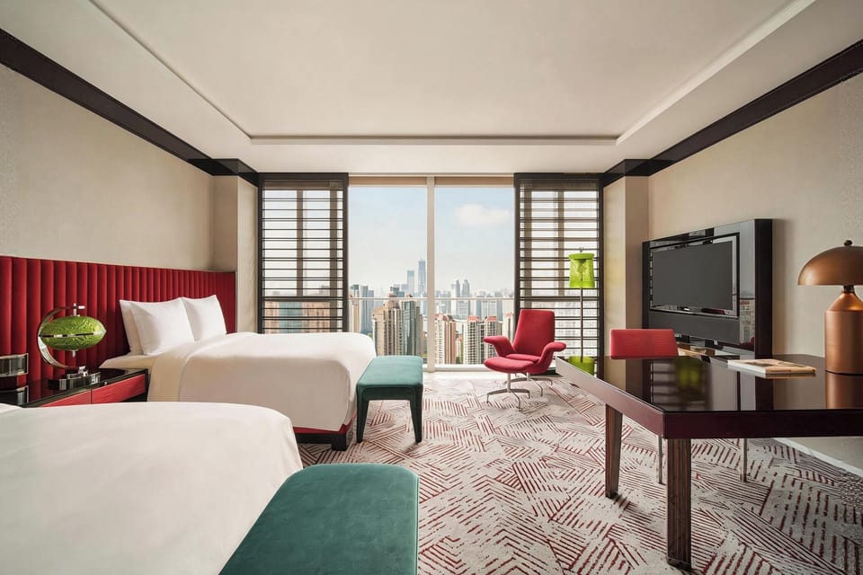 Premium bedding, down comforters, minibar, in-room safe