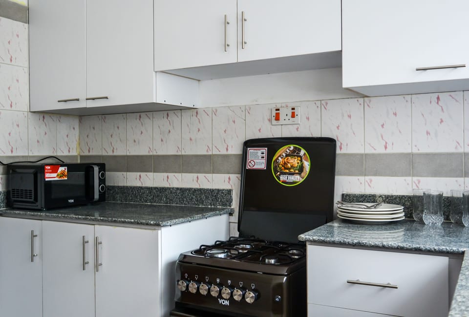 Apartment, 2 Bedrooms | Private kitchenette | Coffee/tea maker, electric kettle