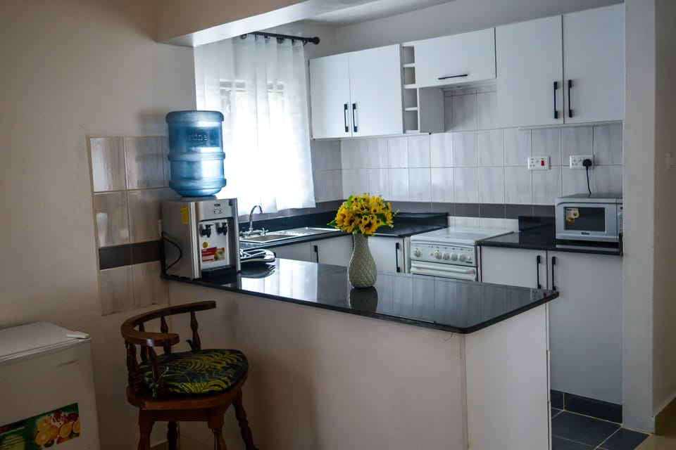 Apartment, 1 Bedroom | Private kitchenette | Coffee/tea maker, electric kettle