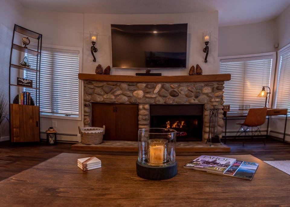 Enjoy the river rock fireplace
