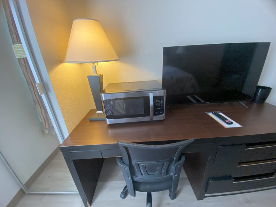 Down comforters, pillowtop beds, desk, laptop workspace