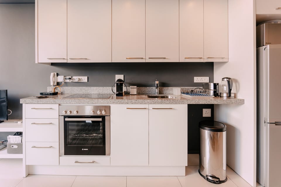Comfort Apartment, 1 Bedroom | Private kitchenette | Full-size fridge, microwave, oven, stovetop