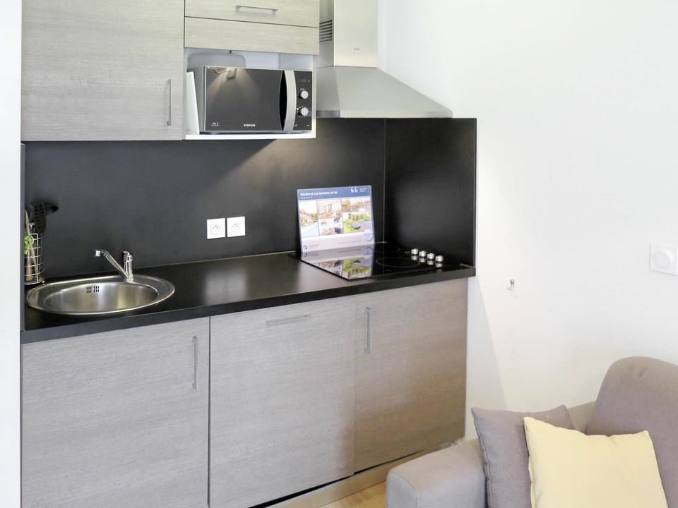 Furniture, Property, Room, Cabinetry, Countertop, Kitchen, Interior Design, Shelf, Material Property, Building