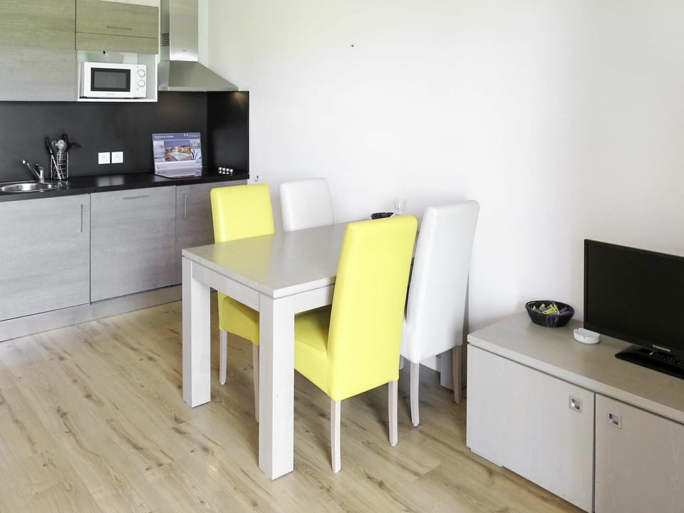 Furniture, Room, Property, Floor, Yellow, Table, Interior Design, Desk, Building, Flooring