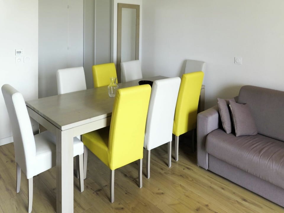 Furniture, Yellow, Room, Table, Property, Interior Design, Chair, Floor, Building, Armrest