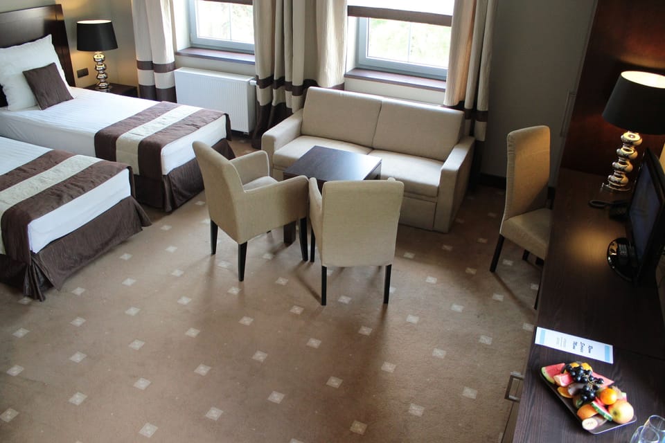 Deluxe Double Room, River View | Minibar, desk, blackout drapes, free WiFi