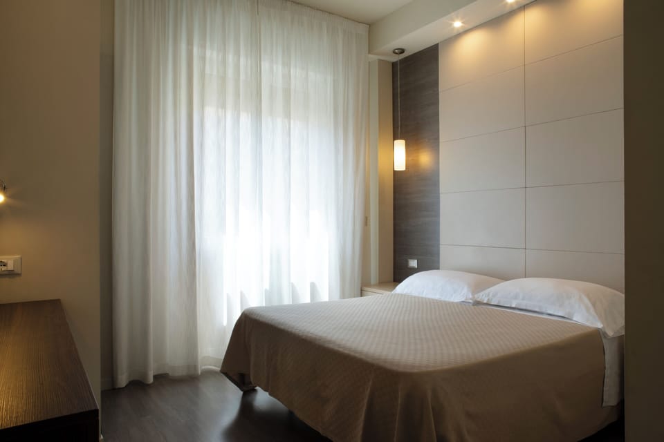 Classic Double Room | Minibar, in-room safe, desk, soundproofing