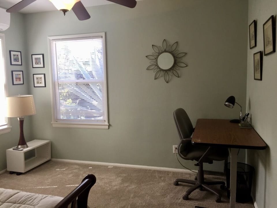 Bedroom 2 with desk and office chair