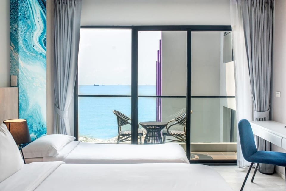 Family Room (Partial Sea View) | In-room safe, desk, laptop workspace, free WiFi