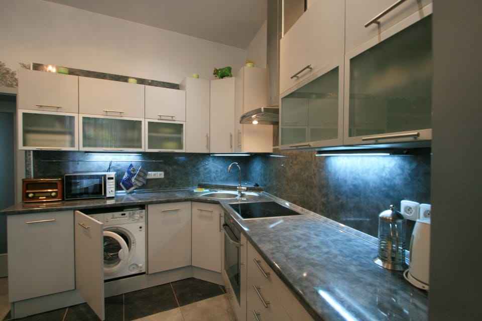 Apartment | Private kitchen | Full-size fridge, microwave, oven, stovetop