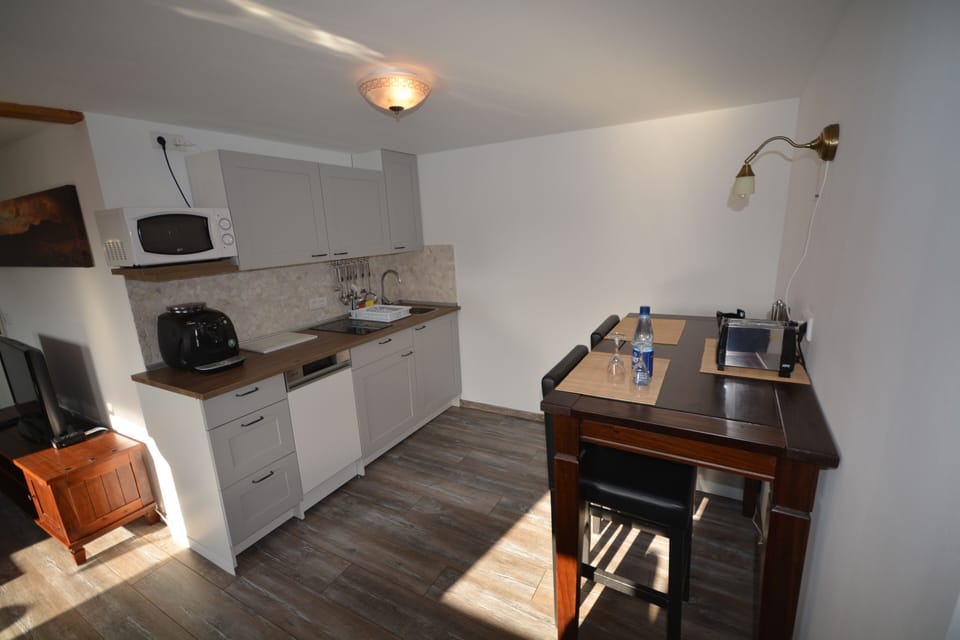 Apartment, 1 Bedroom, Jetted Tub | Private kitchen | Fridge, microwave, electric kettle