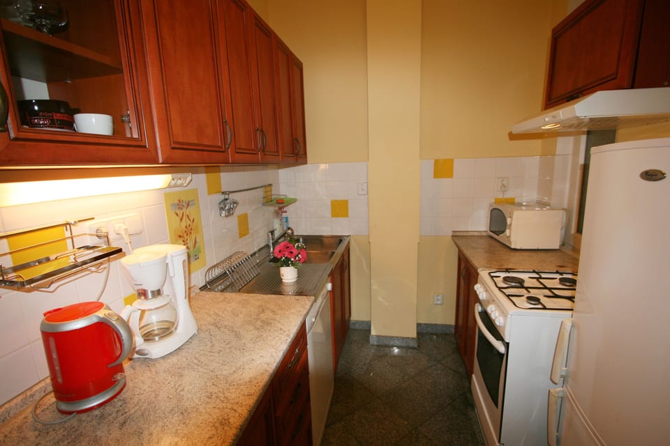 Apartment | Private kitchen | Full-size fridge, microwave, oven, stovetop