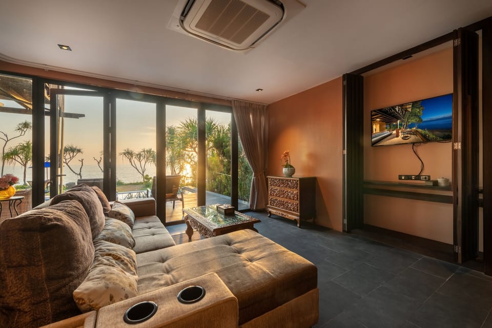 Beachfront Jacuzzi Pool Villa Two Bedroom Duplex with Lounge | Living area | 34-inch flat-screen TV with cable channels, TV
