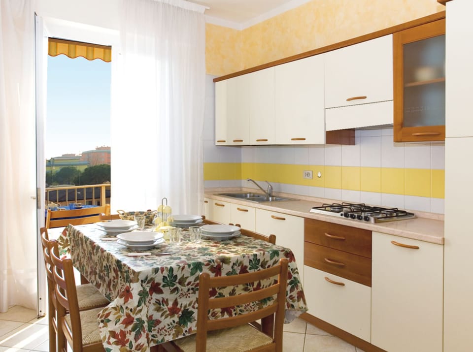 Apartment, 2 Bedrooms (10) | Private kitchen | Full-size fridge, microwave, stovetop, cookware/dishes/utensils