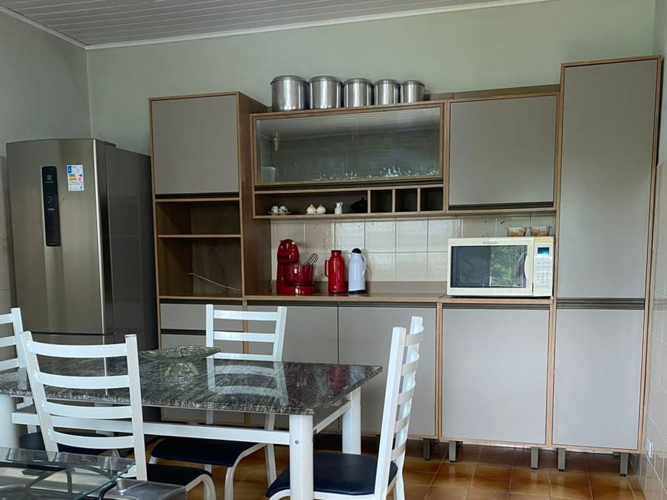 Villa | Private kitchen | Fridge, microwave, oven, stovetop