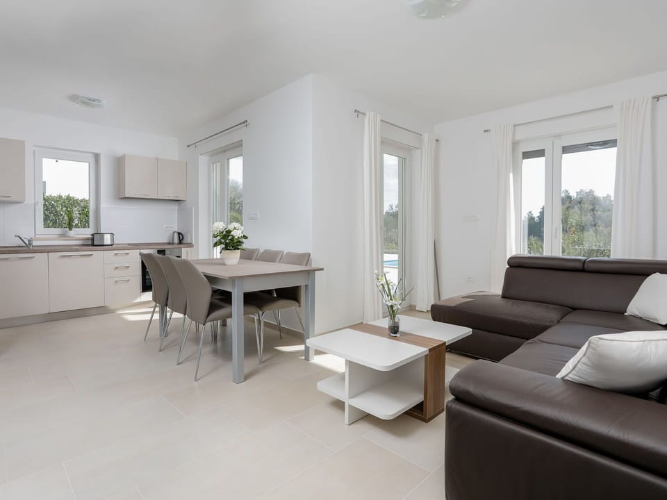 Living Room, Furniture, Room, Interior Design, Property, White, Floor, Building, Coffee Table, Table