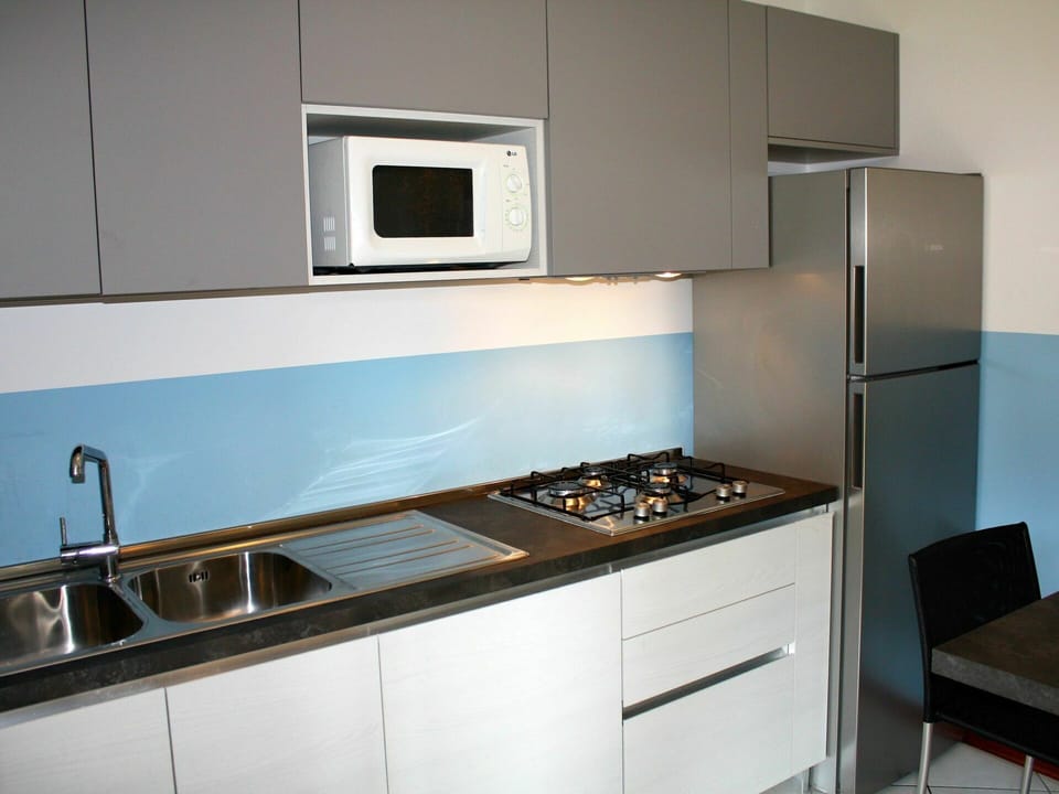 Cabinetry, Building, Property, Kitchen Sink, Furniture, Countertop, Sink, Kitchen Stove, Tap, Kitchen Appliance