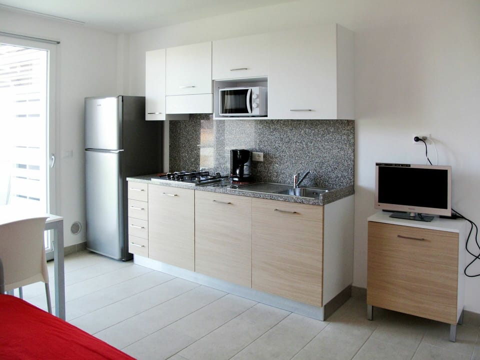Room, Furniture, Property, Cabinetry, Kitchen, Interior Design, Kitchen Stove, Major Appliance, Building, Floor