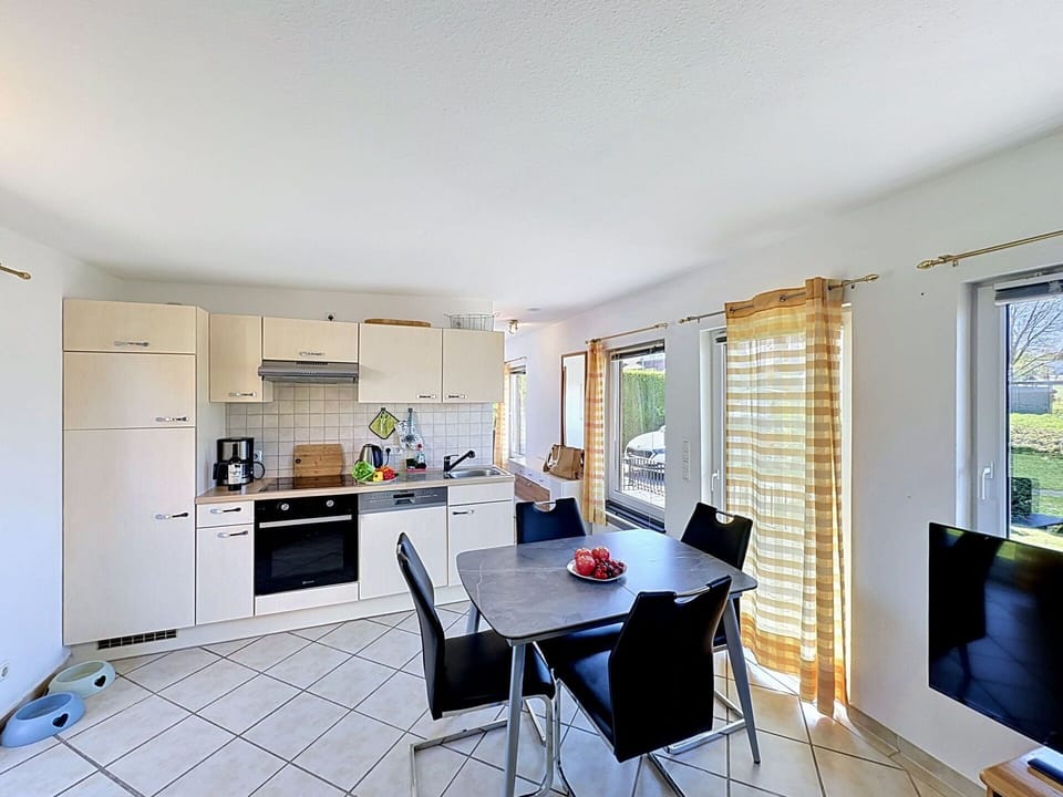 Furniture, Home, Chair, Floor, Apartment, Kitchen & Dining Room Table, Shade, Wood Stain, Houseplant, Hardwood