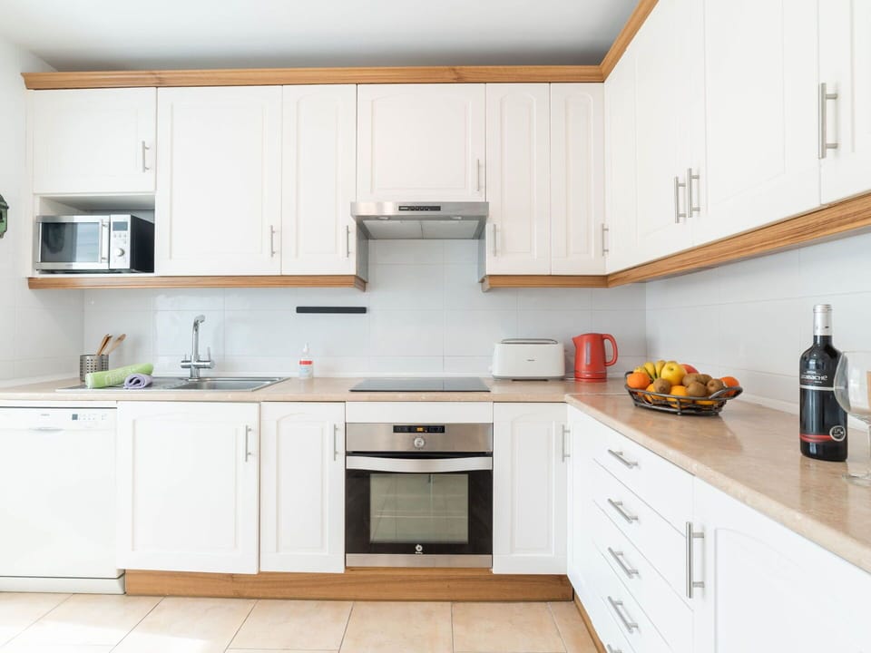 Countertop, Kitchen, Room, Cabinetry, Furniture, Property, Interior Design, Building, House, Floor