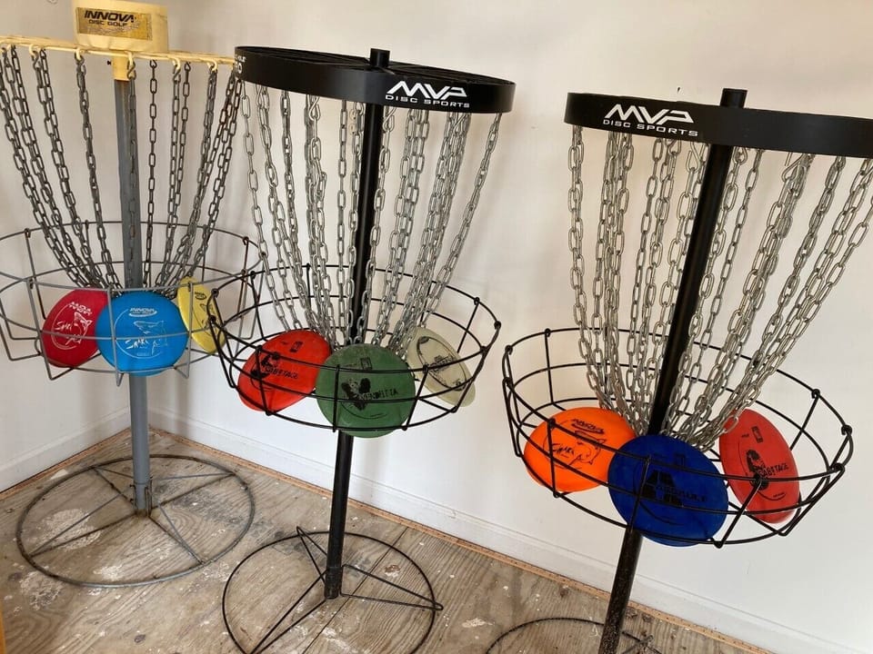 Disk golf cages & disks are in he stg building. Set them up in the yard & enjoy!