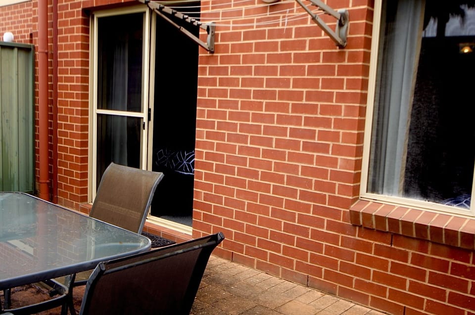 Rare enclosed courtyard and internal ground-floor access offer enhanced privacy and seamless convenience.